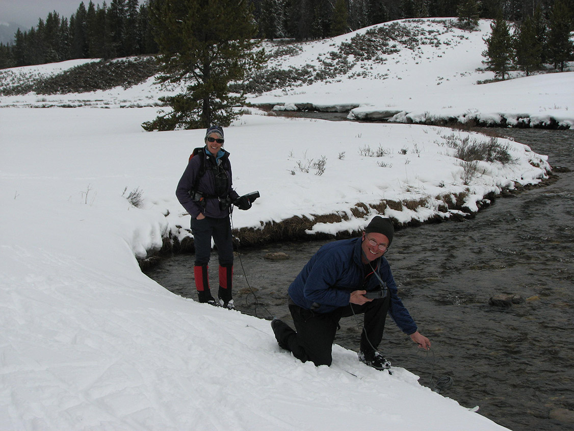 New members Steve and Carolyn Jones using water quality monitoring probes to measure indicators of river health, including: temperature, pH, and dissolved oxygen.
